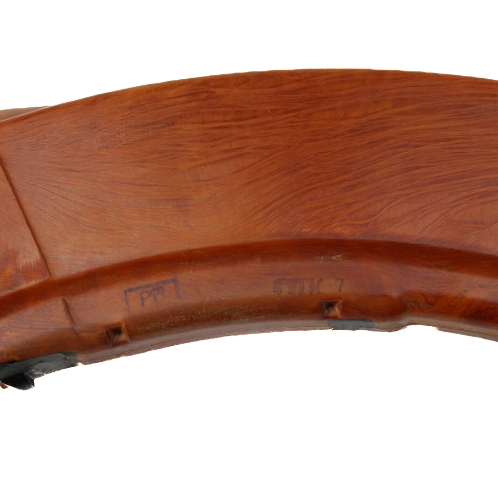 Side profile of an orange Russian Bakelite AK-47 30-round magazine for 7.62x39 rifles showing the Tula factory stamp.