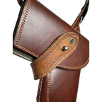Side profile of a handcrafted brown leather tactical holster case for 9mm and 45 caliber pistols.